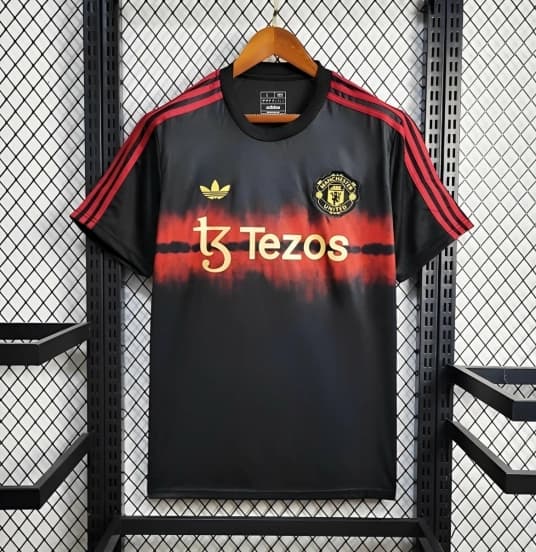 25/26 Manchester United New Year Training Black/Red Jersey — Manchester United Football Club
